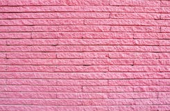 muro-di-mattoni-dipinto-rosa-36776407.jpg
